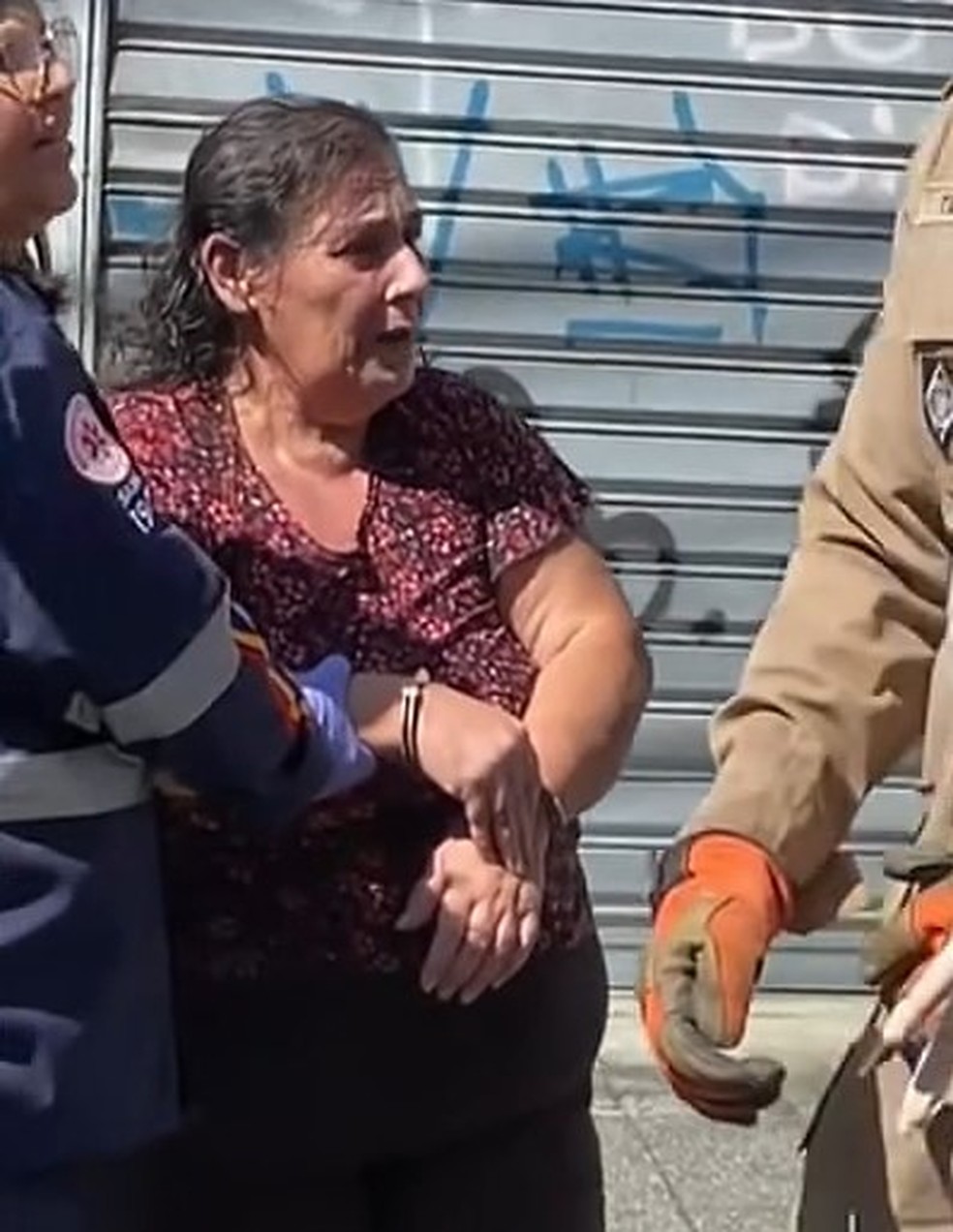 Tânia, a filha de Dario presa na casa onde o corpo foi encontrado — Foto: Reprodução/TV Globo