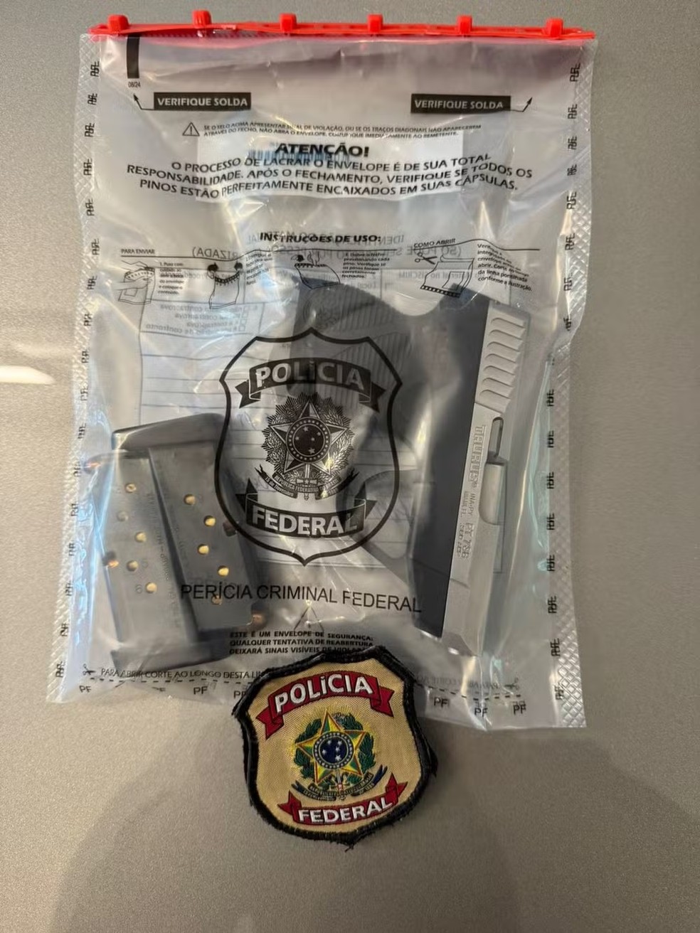 Arma apreendida na casa de Luiz Phillipi Mourão, o 'Sicário', integrante do grupo de Vorcaro — Foto: Reprodução/PF