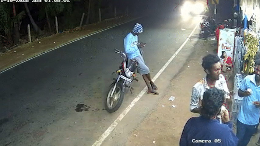 Motociclista escapa por pouco de colisão e cai sentado