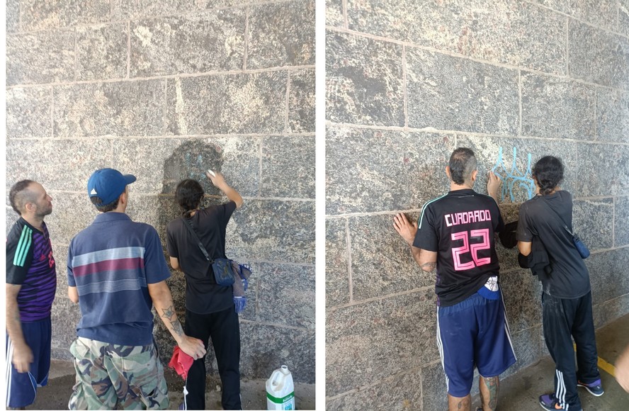 Pichadores colombianos voltam ao Cristo Redentor para limpar e retirar tinta de muro de estacionamento
