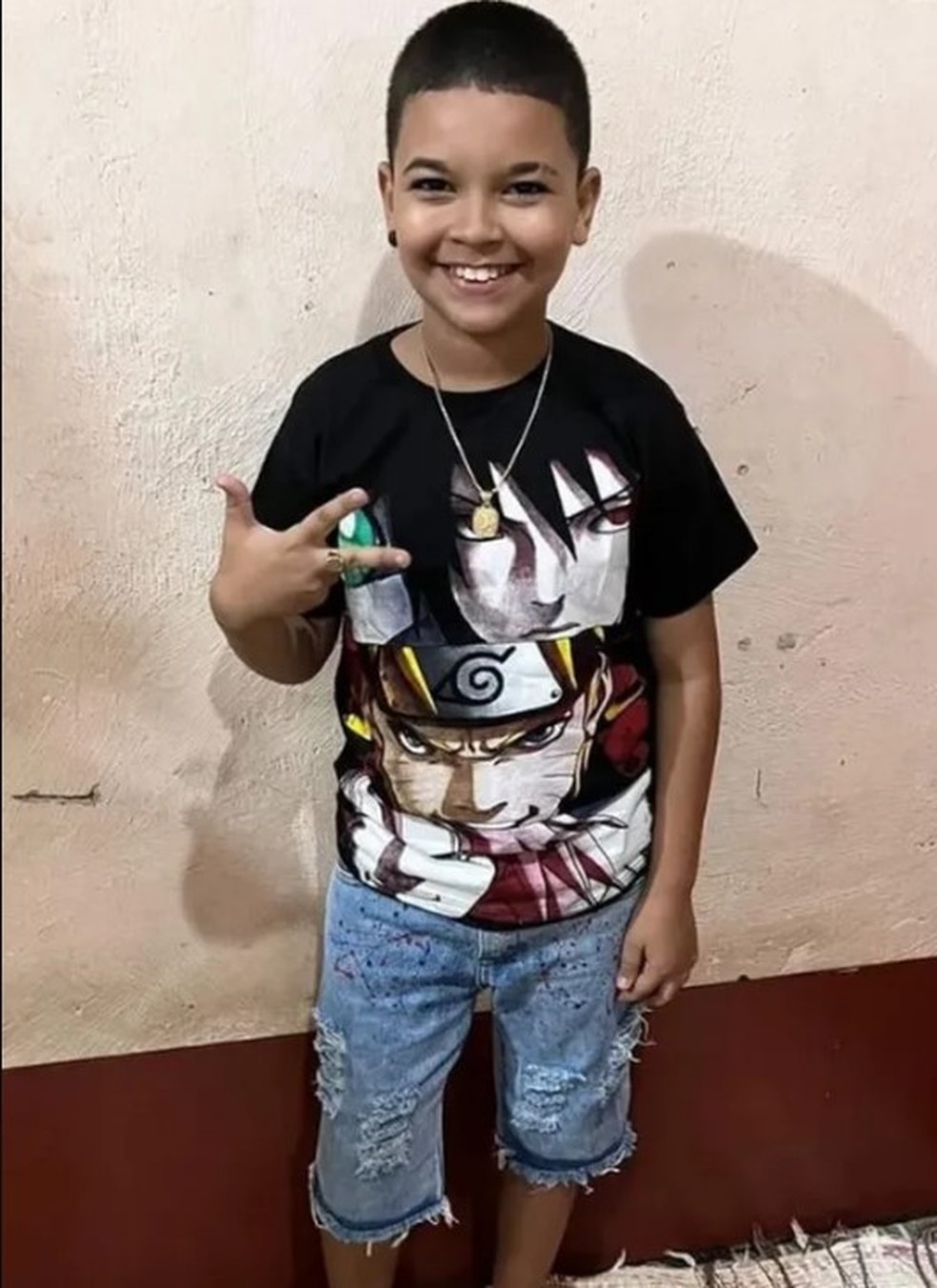 Juan Davi de Souza Faria, de 11 anos, foi baleado na noite do Réveillon, em Nilópolis  — Foto: Reprodução